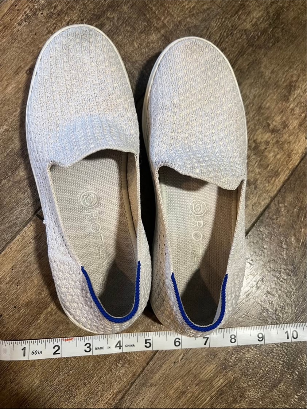 Rothy's Slip-On Knit Loafers in Light Beige with Blue Heel Trim